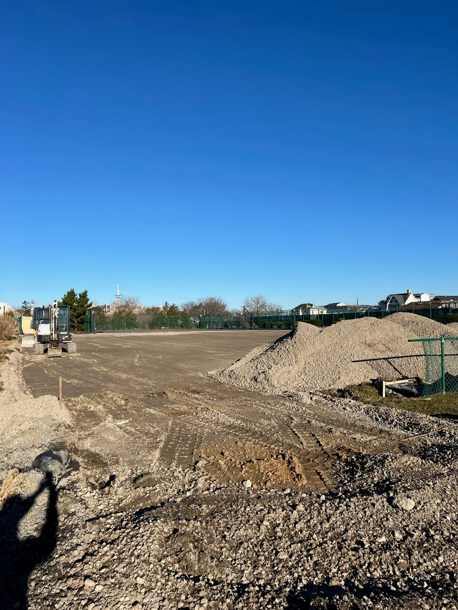 The new tennis courts are on the east side of the recreation complex adjacent to the basketball courts.
