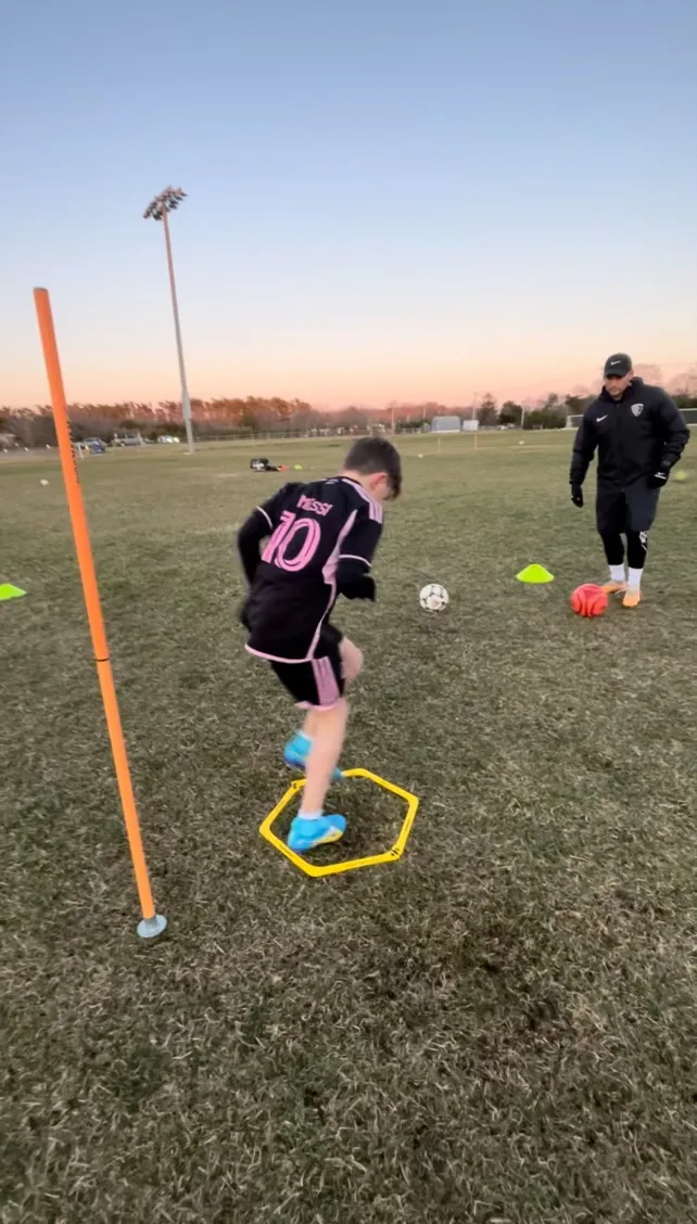 Participant doing soccer drills during a NLS training.