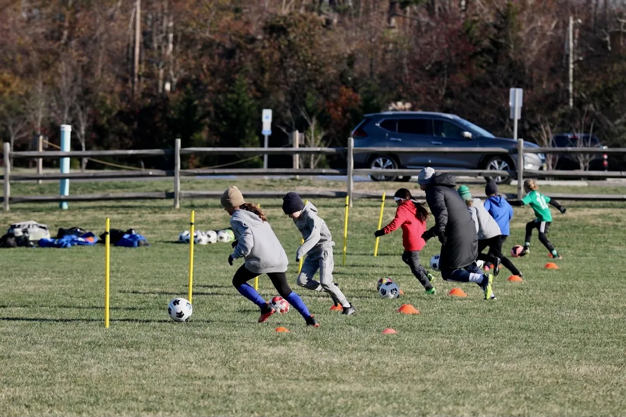 participants doing soccer drills at a NLS training session.