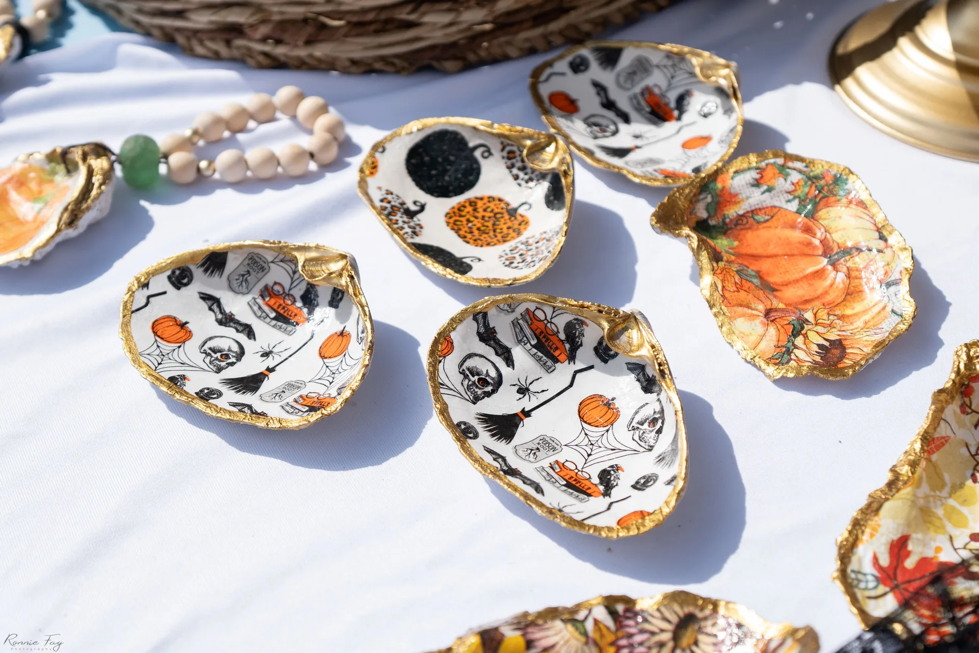 Seashells painted with fall decor.