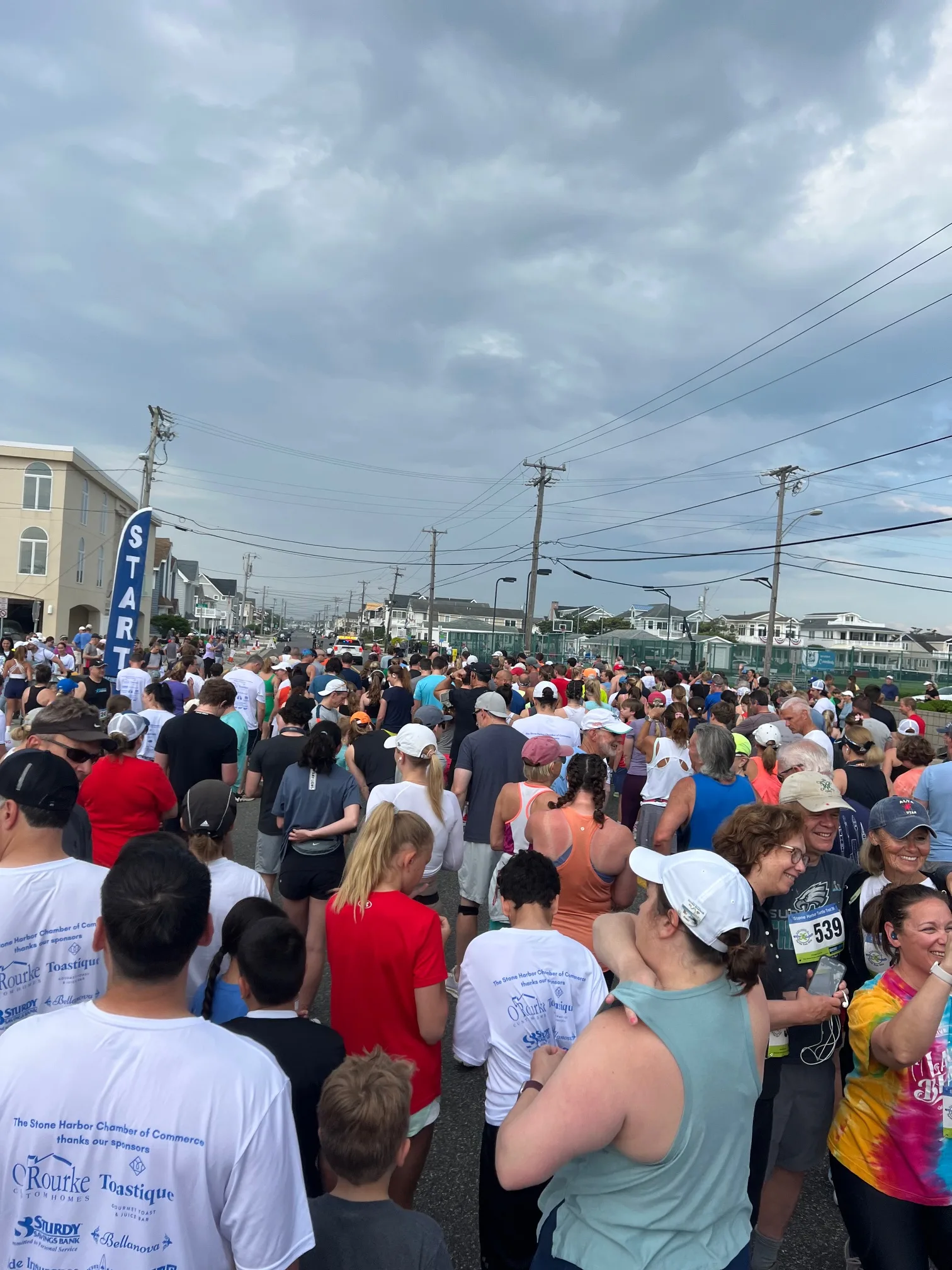 People in a large group lining up to start a race.